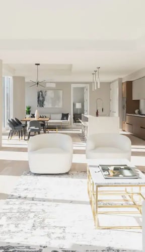 Bright open-plan penthouse with white curved chairs, gold coffee table, and floor-to-ceiling windows